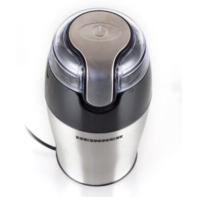 Aparat compact pentru măcinarea cafelei sau condimentelor, model Heinner HCG-150SS, construcție durabilă din inox, silențios și eficient.