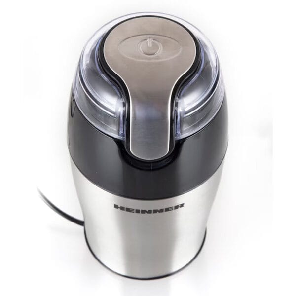 Aparat compact pentru măcinarea cafelei sau condimentelor, model Heinner HCG-150SS, construcție durabilă din inox, silențios și eficient.